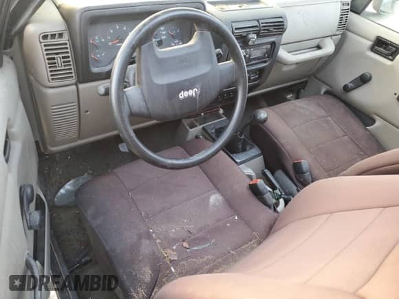 2005 Jeep Wrangler SE z VIN 1J4FA29105P344743, wystawiony jako Copart lot #75524944 z przebiegiem 108 824 mil mil oraz Szkoda całkowita • Salvage title. Historia ofert i sprzedaży dostępna na DreamBid. Obrazek 8.