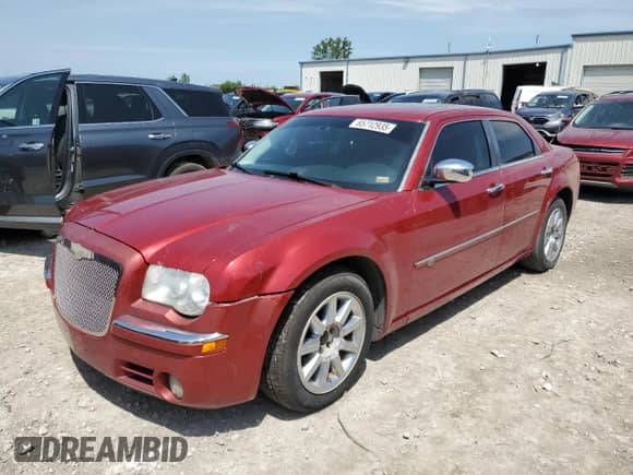 2008 Chrysler 300 C Hemi with VIN 2C3LA63HX8H169596, listed as a Copart auction lot 65712935 with 218,916 mi miles and Salvage title. Bid and sale history available at DreamBid. Image 1.