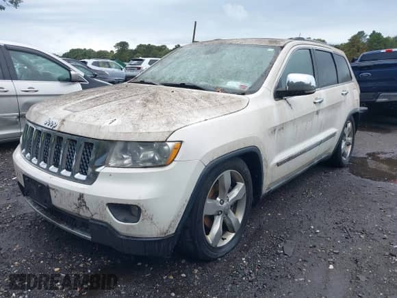 2011 Jeep Grand Cherokee Overland with VIN 1J4RR6GG7BC684446, listed as a IAAI auction lot 43403449 with 169,586 mi miles and . Bid and sale history available at DreamBid. Image 6.