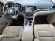 2018 Jeep Grand Cherokee Sterling с VIN 1C4RJFBG7JC199940, выставлен на аукционе Copart как лот 56197985 с пробегом 85 506 миль миль и Списание • Salvage title. История ставок и продаж доступна на DreamBid. Изображение 8.