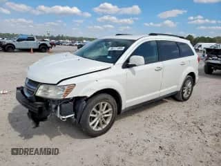 2013 Dodge Journey SXT with VIN 3C4PDCBG2DT619206, listed as a Copart auction lot 86171485 with 252,274 mi miles and Salvage title. Bid and sale history available at DreamBid. Image 1.