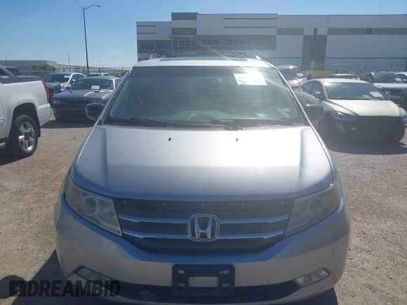 2012 Honda Odyssey Touring с VIN 5FNRL5H95CB122101, выставлен на аукционе IAAI как лот 43489117 с пробегом 154 148 миль миль и . История ставок и продаж доступна на DreamBid. Изображение 12.