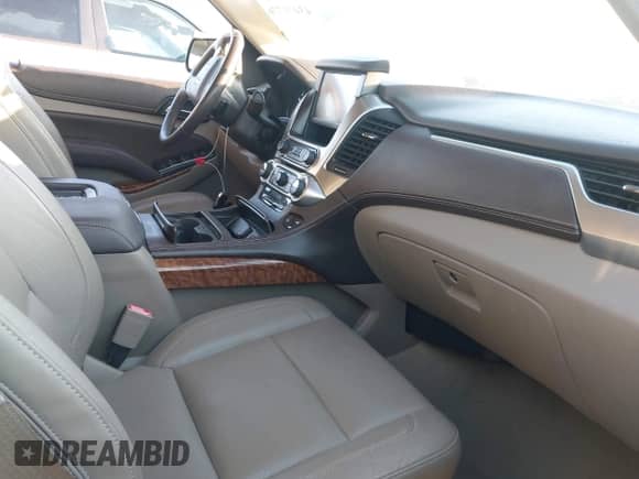 2015 Chevrolet Tahoe LTZ with VIN 1GNSCCKC1FR596109, listed as a IAAI auction lot 43401776 with 74,333 mi miles and . Bid and sale history available at DreamBid. Image 5.