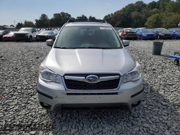 2014 Subaru Forester Limited z VIN JF2SJAHC7EH424473, wystawiony jako Copart lot #71002205 z przebiegiem 128 976 mil mil oraz Szkoda całkowita • Salvage title. Historia ofert i sprzedaży dostępna na DreamBid. Obrazek 5.