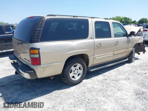 2005 Chevrolet Suburban LT with VIN 1GNEC16Z75J117611, listed as a IAAI auction lot 41946614 with 273,541 mi miles and . Bid and sale history available at DreamBid. Image 4.