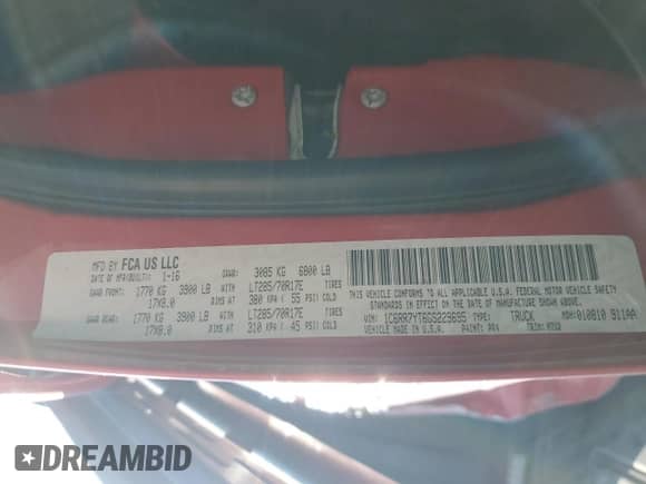 2016 Ram 1500 Rebel z VIN 1C6RR7YT6GS229695, wystawiony jako Copart lot #71909355 z przebiegiem 93 110 mil mil oraz Szkoda całkowita • Salvage title. Historia ofert i sprzedaży dostępna na DreamBid. Obrazek 13.