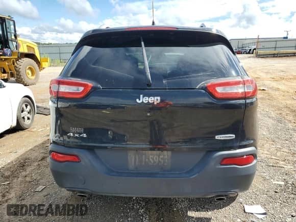 2014 Jeep Cherokee Latitude with VIN 1C4PJMCS5EW127895, listed as a Copart auction lot 66995905 with 125,293 mi miles and Salvage title. Bid and sale history available at DreamBid. Image 6.