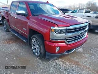 2018 Chevrolet Silverado 1500 High Country z VIN 3GCUKTEJ4JG293333, wystawiony jako IAAI lot #41727907 z przebiegiem 60 988 mil mil oraz . Historia ofert i sprzedaży dostępna na DreamBid. Obrazek 1.