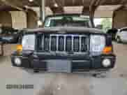 2006 Jeep Commander with VIN 1J8HH48N96C253790, listed as a Copart auction lot 64652495 with 158,803 mi miles and Salvage title. Bid and sale history available at DreamBid. Image 5.