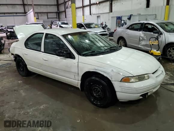 2000 Dodge Stratus SE with VIN 1B3EJ46X5YN299869, listed as a Copart auction lot 88545505 with 112,088 mi miles and Salvage title. Bid and sale history available at DreamBid. Image 4.