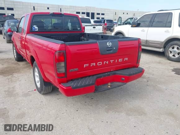 2002 Nissan Frontier XE with VIN 1N6DD26S42C330099, listed as a IAAI auction lot 42702539 with 319,749 mi miles and . Bid and sale history available at DreamBid. Image 3.