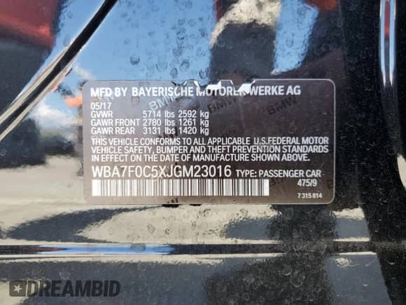 2018 BMW 7 Series 750i with VIN WBA7F0C5XJGM23016, listed as a Copart auction lot 51284255 with 69,460 mi miles and Salvage title. Bid and sale history available at DreamBid. Image 14.