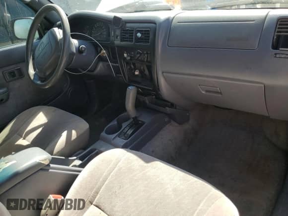 2000 Toyota Tacoma PreRunner with VIN 5TESM92N6YZ695316, listed as a Copart auction lot 87020305 with 296,491 mi miles and Salvage title. Bid and sale history available at DreamBid. Image 8.