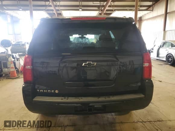 2020 Chevrolet Tahoe LS z VIN 1GNSKAKCXLR301110, wystawiony jako Copart lot #57218565 z przebiegiem 92 922 mil mil oraz Szkoda całkowita • Salvage title. Historia ofert i sprzedaży dostępna na DreamBid. Obrazek 6.