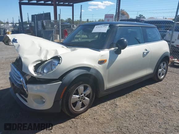 2015 MINI Hardtop with VIN WMWXM5C51FT942280, listed as a IAAI auction lot 43426392 with 55,639 mi miles and . Bid and sale history available at DreamBid. Image 2.