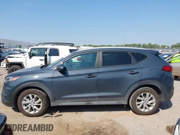 2021 Hyundai Tucson Value with VIN KM8J33A48MU323253, listed as a IAAI auction lot 43175065 with 68,345 mi miles and . Bid and sale history available at DreamBid. Image 14.