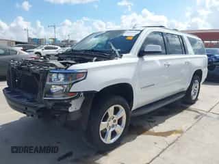 2016 Chevrolet Suburban LT z VIN 1GNSCHKC6GR143361, wystawiony jako IAAI lot #43343507 z przebiegiem 147 446 mil mil oraz . Historia ofert i sprzedaży dostępna na DreamBid. Obrazek 2.