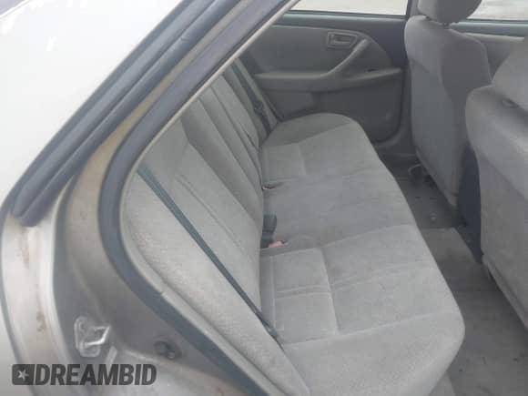 2000 Toyota Camry LE z VIN JT2BG22KXY0418018, wystawiony jako IAAI lot #43381609 z przebiegiem 169 958 mil mil oraz . Historia ofert i sprzedaży dostępna na DreamBid. Obrazek 8.