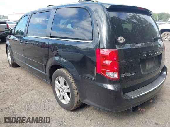 2013 Dodge Grand Caravan Crew with VIN 2C4RDGDG3DR596244, listed as a IAAI auction lot 42951296 with 117,400 mi miles and . Bid and sale history available at DreamBid. Image 3.