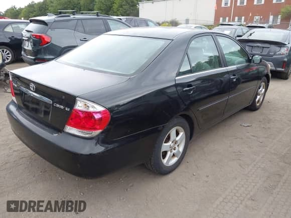 2005 Toyota Camry LE with VIN 4T1BE30K95U405962, listed as a IAAI auction lot 43040450 with 100,149 mi miles and . Bid and sale history available at DreamBid. Image 4.