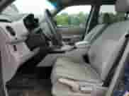 2010 Honda Pilot LX with VIN 5FNYF3H29AB014670, listed as a Copart auction lot 56942375 with 178,729 mi miles and Salvage title. Bid and sale history available at DreamBid. Image 7.