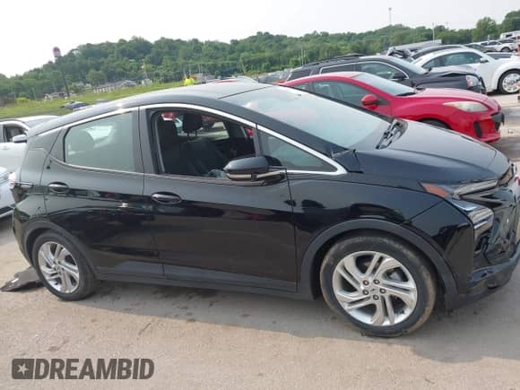 2023 Chevrolet Bolt EV 1LT with VIN 1G1FW6S0XP4140142, listed as a IAAI auction lot 42353165 with 30,244 mi miles and . Bid and sale history available at DreamBid. Image 12.