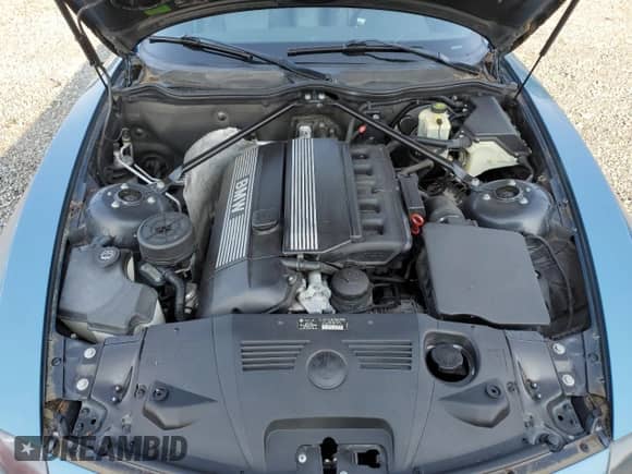 2005 BMW Z4 2.5i z VIN 4USBT33535LR70689, wystawiony jako Copart lot #61991005 z przebiegiem 150 144 mil mil oraz Szkoda całkowita • Salvage title. Historia ofert i sprzedaży dostępna na DreamBid. Obrazek 11.