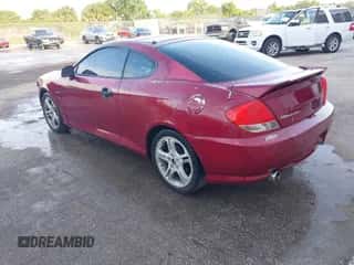 2006 Hyundai Tiburon GT с VIN KMHHN65FX6U229156, выставлен на аукционе IAAI как лот 42082179 с пробегом 172 207 миль миль и . История ставок и продаж доступна на DreamBid. Изображение 3.