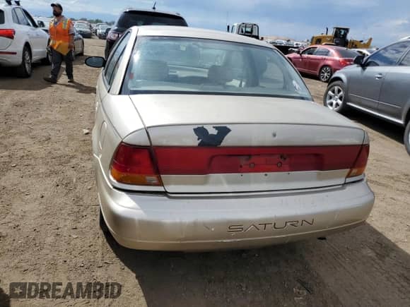 1996 Saturn SL with VIN 1G8ZK5277TZ318927, listed as a Copart auction lot 69162164 with 87,447 mi miles and Clean title. Bid and sale history available at DreamBid. Image 7.