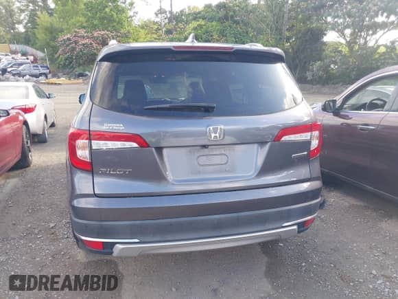 2022 Honda Pilot Touring 7-Passenger z VIN 5FNYF5H65NB001015, wystawiony jako IAAI lot #42523024 z przebiegiem 86 584 mil mil oraz . Historia ofert i sprzedaży dostępna na DreamBid. Obrazek 16.