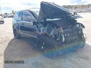 2012 Jeep Grand Cherokee SRT-8 with VIN 1C4RJFDJ9CC148452, listed as a IAAI auction lot 43511139 with Not provided miles and . Bid and sale history available at DreamBid. Image 1.