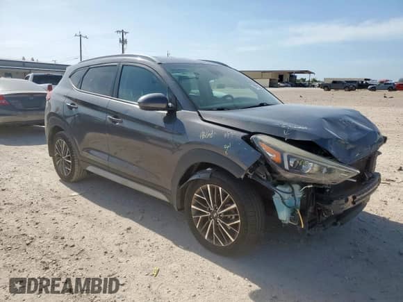 2020 Hyundai Tucson Sport with VIN KM8J33AL1LU172116, listed as a Copart auction lot 64653475 with 100,913 mi miles and Salvage title. Bid and sale history available at DreamBid. Image 4.