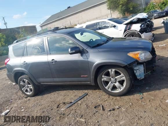 2012 Toyota RAV4 Sport with VIN JTMRF4DV1C5057155, listed as a IAAI auction lot 43163940 with 103,651 mi miles and . Bid and sale history available at DreamBid. Image 13.