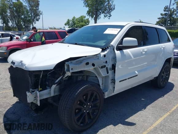 2020 Jeep Grand Cherokee Laredo E with VIN 1C4RJEAG1LC170576, listed as a IAAI auction lot 42283104 with 123,068 mi miles and . Bid and sale history available at DreamBid. Image 18.