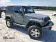 2014 Jeep Wrangler Sport with VIN 1C4AJWAG6EL259663, listed as a Copart auction lot 69886865 with 145,204 mi miles and Salvage title. Bid and sale history available at DreamBid. Image 4.