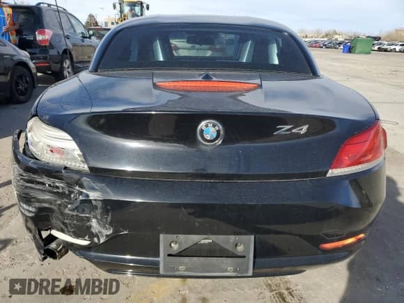 2013 BMW Z4 sDrive28i with VIN WBALL5C50DJ103778, listed as a Copart auction lot 49452215 with 104,203 mi miles and Salvage title. Bid and sale history available at DreamBid. Image 6.