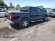 2009 Nissan Frontier SE with VIN 1N6AD07U89C422429, listed as a Copart auction lot 58546945 with 140,325 mi miles and Salvage title. Bid and sale history available at DreamBid. Image 3.