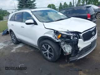 2016 Kia Sorento EX with VIN 5XYPHDA10GG016872, listed as a IAAI auction lot 42479799 with 153,553 mi miles and . Bid and sale history available at DreamBid. Image 1.