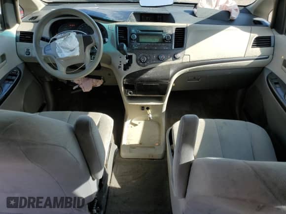 2012 Toyota Sienna with VIN 5TDZK3DC9CS275794, listed as a Copart auction lot 82216295 with 130,044 mi miles and Salvage title. Bid and sale history available at DreamBid. Image 8.