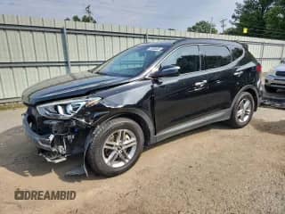 2018 Hyundai Santa Fe 2.4L с VIN 5NMZU3LB1JH074698, выставлен на аукционе Copart как лот 71508555 с пробегом 115 356 миль миль и Списание • Salvage title. История ставок и продаж доступна на DreamBid. Изображение 1.