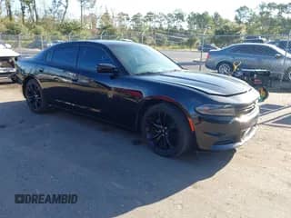 2017 Dodge Charger SE with VIN 2C3CDXBG0HH575960, listed as a IAAI auction lot 43321197 with 121,997 mi miles and . Bid and sale history available at DreamBid. Image 1.