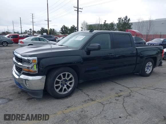 2017 Chevrolet Silverado 1500 LT with VIN 3GCPCREH2HG121743, listed as a IAAI auction lot 41742546 with 66,586 mi miles and . Bid and sale history available at DreamBid. Image 2.