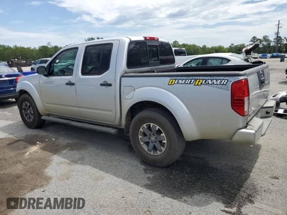 2017 Nissan Frontier Desert Runner with VIN 1N6DD0ER5HN704719, listed as a Copart auction lot 58788555 with 152,557 mi miles and Salvage title. Bid and sale history available at DreamBid. Image 2.