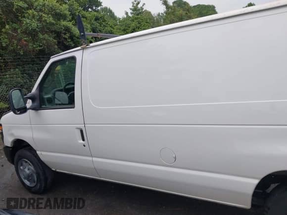 2012 Ford Econoline Cargo Commercial with VIN 1FTNE1EW0CDA98132, listed as a IAAI auction lot 42900339 with 264,472 mi miles and . Bid and sale history available at DreamBid. Image 14.