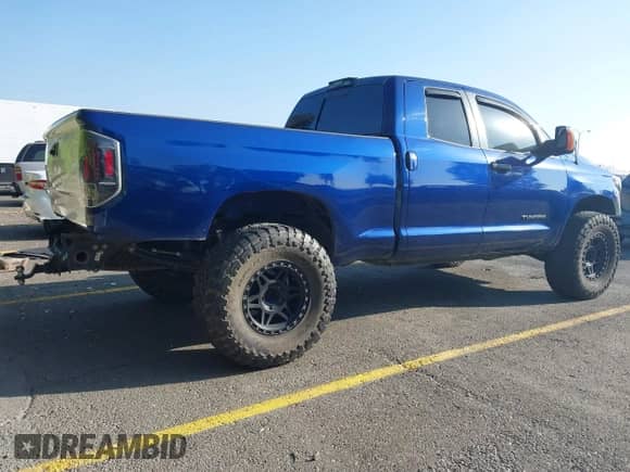 2015 Toyota Tundra SR z VIN 5TFUW5F14FX444236, wystawiony jako IAAI lot #43312117 z przebiegiem 225 064 mil mil oraz . Historia ofert i sprzedaży dostępna na DreamBid. Obrazek 4.