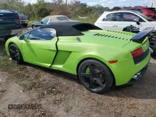 2013 Lamborghini Gallardo с VIN ZHWGU6BZ9DLA12793, выставлен на аукционе Copart как лот 77525804 с пробегом 11 777 миль миль и Списание • Salvage title. История ставок и продаж доступна на DreamBid. Изображение 2.