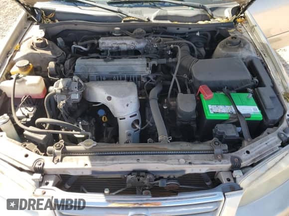 2001 Toyota Camry CE z VIN JT2BG22K610576099, wystawiony jako Copart lot #70216365 z przebiegiem 53 200 mil mil oraz Szkoda całkowita • Salvage title. Historia ofert i sprzedaży dostępna na DreamBid. Obrazek 11.