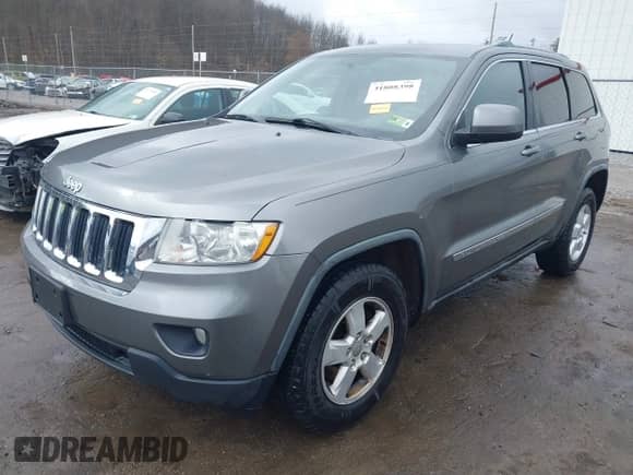 2012 Jeep Grand Cherokee Laredo с VIN 1C4RJFAGXCC118823, выставлен на аукционе IAAI как лот 41808398 с пробегом 153 509 миль миль и . История ставок и продаж доступна на DreamBid. Изображение 17.