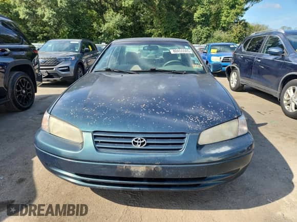 1997 Toyota Camry LE z VIN 4T1BF22K1VU900614, wystawiony jako Copart lot #80455505 z przebiegiem 200 444 mil mil oraz Szkoda całkowita • Salvage title. Historia ofert i sprzedaży dostępna na DreamBid. Obrazek 5.
