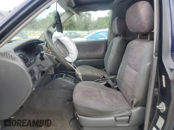 2001 Chevrolet Tracker with VIN 2CNBE18C816911034, listed as a Copart auction lot 88693025 with Not provided miles and Salvage title. Bid and sale history available at DreamBid. Image 7.
